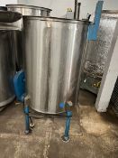 Used approximately 120 gallon stainless steel vertical tank. Approximately 30