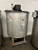 Used approximately 230 gallon stainless steel vertical tank. Approximately 43