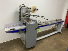 SIG FLOW WRAPPER, M/N STRATUS, S/N 03-24884, 220 VOLTS, 1 PHASE, MOUNTED ON PORTABLE FRAME (LOCATED