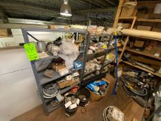 CONTENTS OF MIDDLE SHELVING UNITS, INCLUDES BELTS, ASSORTED ELECTRICAL PLUGS, LIGHT PROTECTION UNITS