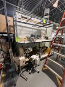 CONTENTS ON RACK, INCLUDES BOOT SANITIZER, ES ARM EXTRACTION ARM EXTENSION, POLISHER