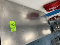 STAINLESS STEEL TABLE WITH UPPER AND LOWER SHELF DIMENSIONS APPROXIMATELY 60