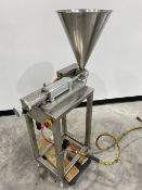 Stainless Steel Piston Filler. This is a pneumatic driven piston Filler. Video available per