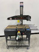 Loveshaw Case Taper. Model: LDU/2, Driven by a 1/3 Hp, 110 Volts, 1 Phase, 60 Hz motor. Missing Tape