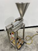 Stainless Steel Piston Filler. This is a pneumatic driven piston Filler. Video available per