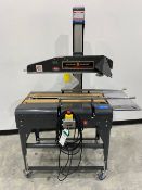 Loveshaw Case Taper. Model: LDU/2, Driven by a 1/3 Hp, 110 Volts, 1 Phase, 60 Hz motor. Missing Tape