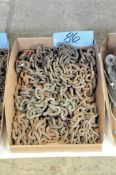 Lot-Various Short Chains in (1) Box on Floor Under (1) Table