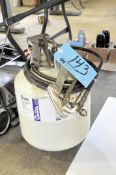 DP2590 Solvent Base Adhesive, Tank, and Sprayer on Floor Under (1) Table