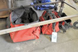 Lot-Various Cordless Tool Bags on Floor Under (1) Bench