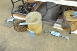 Lot-(3) Various Chains and (1) Lifting Fixture on Floor Under (1) Table