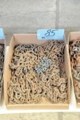 Lot-Various Short Chains in (1) Box on Floor Under (1) Table