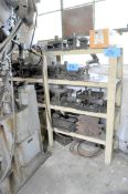 Lot-Dies on (4) Shelves with (2) Shelving Units