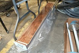 Lot-Flooring Materials in (1) Box on Floor Under (1) Table