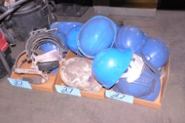 Lot-Safety Hats in (3) Boxes on Floor Under (1) Table