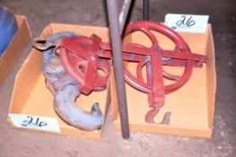 Lot-Various Pully Hooks in (2) Boxes on Floor Under (1) Table