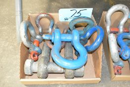 Lot-Various Clevises in (1) Box on Floor Under (1) Table