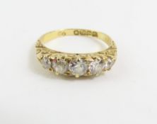 An early 20th century 18ct gold, diamond five ston
