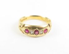 An early 20th century ruby and diamond five stone