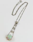 An Art Deco opal and diamond necklet, the high dom