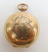 A round sovereign case, with monogram to the front