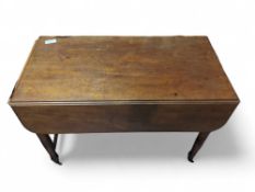 A Victorian mahogany Pembroke table fitted with si