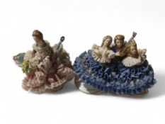 Two West German porcelain figures - lady playing a