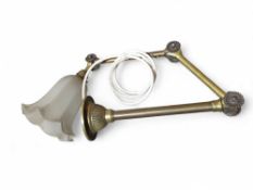 An early 20th Century adjustable brass wall light