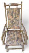 A 20th century American rocking chair, in a light
