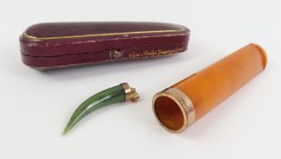 An amber cheroot holder,