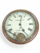 A Victorian circular wall timepiece in wood case,