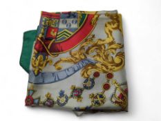 A Hermes silk scarf with colour printed coat of ar