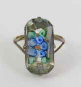 A vintage ring, set with a lozenge shaped plastic