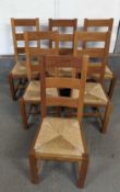 A set of six modern rush seated dining chairs