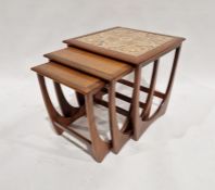 Mid-century G-Plan-style teak nest of three occasional tables, largest with tile top, 51cm high x