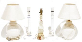 Pair of painted wooden table lamps, an onyx table lamp and a pair of baluster-shaped pottery table