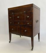 Georgian mahogany campaign writing/vanity cabinet, the lift-up top revealing compartments and