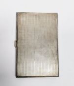 Silver cigarette case, rectangular, engine-turned, 5ozt