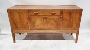 1969/70 Oliver Morel Cotswold School walnut sideboard having slight raised edge to the back, central