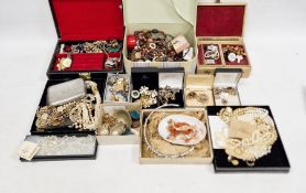 Large quantity of costume jewellery including pearl necklaces, brooches, bangles, various