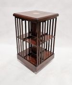 Edwardian inlaid mahogany revolving bookcase, 84cm high x 46cm wide