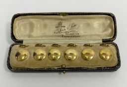 Set of six antique gold studs in Furber & Son gilt leather case, 19.5g total approx.
