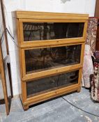Oak Globe Wernicke three section bookcase measuring approx. 111cm high, 85cm wide,29cm deepCondition