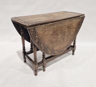 Carved oak dropleaf table on turned supports and stretchers, 75cm high x 113cm wide x 50cm deep