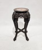 Early 20th century Chinese hardwood jardiniere stand of circular form with marble insert to the top,