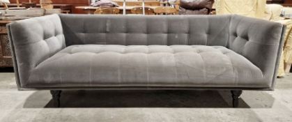 Contemporary three seat velvet upholstered sofa, grey in colour, raised upon turned feet, 74cm