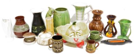 Pair of vintage Arthur Wood jugs with relief floral decoration, an Arthur Wood pearlescent glazed