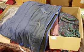 Four boxes of assorted various sized horse rugs, outdoor and stable rugs