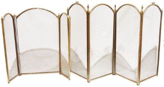 Two folding spark guards and a wicker washing basket (3)