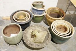 Composite stone planter on pedestal base, a pair of composite stone plant pots, together with