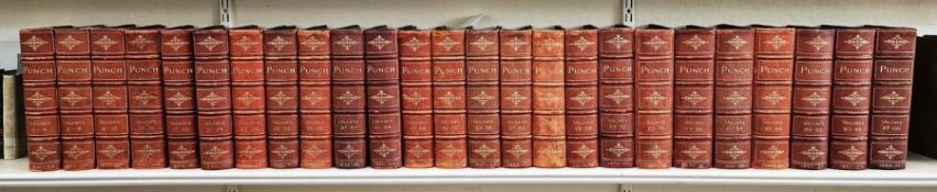 Bound volumes of Punch 1841 complete run through to 1891, half leather, green boards, marbled ep,